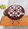 Colorful handcrafted Moroccan mosaic table with intricate designs, perfect for enhancing indoor and outdoor spaces.
