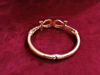 Picture of Handmade item Bracelet width: 15 Millimeters; Bracelet length: 40 Millimeters Materials: Gold, Silver