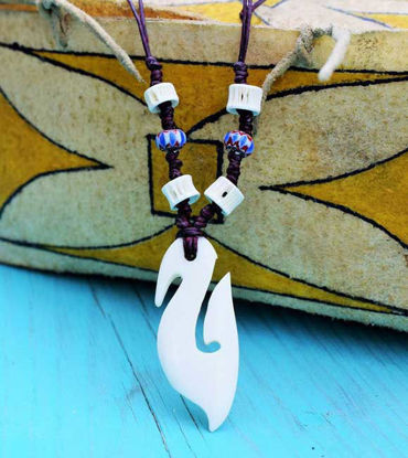 Picture of Surfer's Luck: Hand-Carved Maori Tribal Necklace - Adjustable Natural Bone Charm for Men & Teens