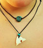 Picture of Artisan-made Hand-Carved Bone Necklace Maori Tribal Style: Surfer Lucky Symbol