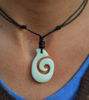 Picture of Artisan-made Hand-Carved Bone Necklace Maori Tribal Style: Surfer Lucky Symbol