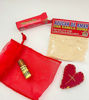 Spiritual perfume and amulet set made with natural ingredients, aimed at enhancing love, passion, and protective energy.