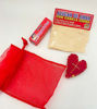 Set of handmade perfume and amulet, crafted with flowers and oils to attract love and offer spiritual protection.