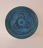Decorative 14-inch blue ceramic plate, handpainted with unique designs, showcasing Moroccan craftsmanship for dining or display.