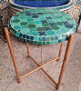 Green and gold mosaic table with a copper base, showcasing Moroccan Zellige tiles, perfect for indoor or outdoor use.