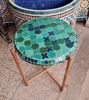 Custom emerald green mosaic table with a copper base, featuring handcrafted Moroccan tiles, ideal for patios or dining areas.