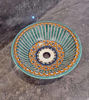 Colorful hand-painted Moroccan ceramic vessel sink with elegant design, perfect for modern or traditional bathroom decor.
