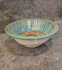 Customizable Moroccan ceramic sink featuring vibrant hand-painted motifs, blending craftsmanship with modern elegance.