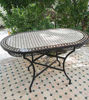Handmade Moroccan mosaic table with intricate Zellige tilework, ideal for adding elegance to any indoor or outdoor space.