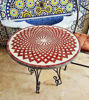 Round outdoor coffee table with a vibrant red Zellige mosaic design, showcasing intricate patterns and Moroccan craftsmanship.
