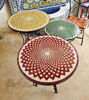 Elegant round coffee table with a red mosaic design, handcrafted in Morocco, ideal for patios, gardens, or as an accent piece.