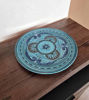 Artisan-made Moroccan dinnerware set with intricate blue patterns on white clay plates, perfect for everyday use or special occasions.