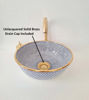 Artisan-crafted Moroccan sink in gold and blue, with a gold handle, blending functionality and bohemian elegance for bathrooms.