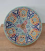 Colorful handmade Moroccan ceramic sink with intricate patterns, showcasing mid-century modern design.