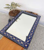 Handmade Moroccan mosaic wall mirror featuring intricate blue and white designs, suitable for indoor and outdoor use.
