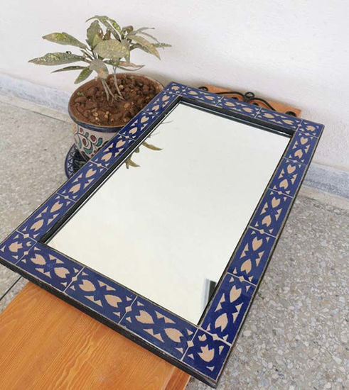Handmade Moroccan mosaic wall mirror featuring intricate blue and white designs, suitable for indoor and outdoor use.