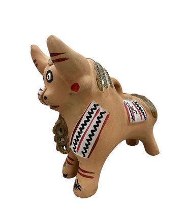 Handmade Pucara Bull clay figurine, symbolizing protection and prosperity, featuring vibrant Andean designs and traditional craftsmanship.