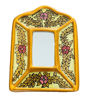 Yellow mirror with floral designs, featuring a 4-inch carved wood frame and gold leaf accents, showcasing artisan craftsmanship.