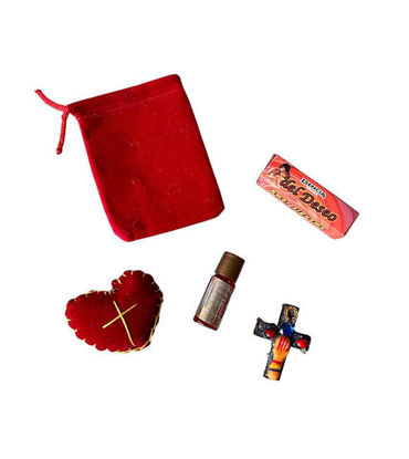 Essencia del Deseo Kit: Fragrant oil, symbolic amulet, and magnetic abundance cross for intention-setting and spiritual practices.