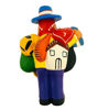 A ceramic Ekeko doll, 9 inches tall, featuring a man with a guitar, embodying abundance and good luck in Peruvian folklore.
