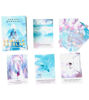 Spanish Starseed Oracle Cards displayed on a cozy blanket, featuring vibrant artwork for spiritual awakening and divination.