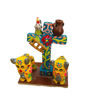 Vibrant cross featuring two cows and a bird, representing Andean heritage and symbols of protection and prosperity.