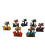 Six colorful handmade clay animal figurines from the Andes, representing cultural heritage and symbols of protection.