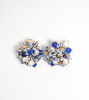 Picture of Bouquet clip earrings with little blue ceramic flowers, pearls and stones