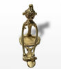 Handmade brass figurine of a tribal woman seated, showcasing Dhokra artistry and the essence of rural Indian life.