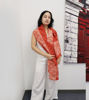 Elegant red silk shawl adorned with intricate hand-painted fractal patterns reflecting cultural artistry.