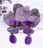 Elegant purple amethyst drop earrings set in gold-plated brass, showcasing natural stone variations.