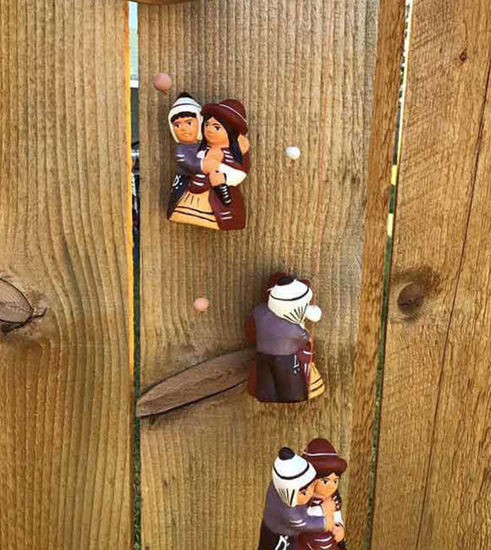 Picture of Cholitos Couple Wind Chime - Handcrafted Peruvian Folk Art in Terracotta
