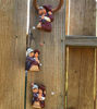 Picture of Cholitos Couple Wind Chime - Handcrafted Peruvian Folk Art in Terracotta