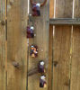 Picture of Cholitos Couple Wind Chime - Handcrafted Peruvian Folk Art in Terracotta
