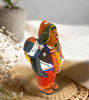 Handcrafted 7" Ekeko Doll figurine of a man holding a guitar and bag, symbolizing prosperity and good fortune from Peru.