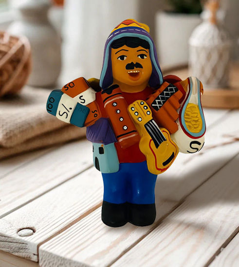 Ekeko doll figurine, 5" tall, depicting a man with a guitar, symbolizing abundance and prosperity, handmade in Peru.