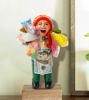 Handmade 7" Ekeko figurine of a man holding a money bag, symbolizing abundance and good luck in Andean culture.