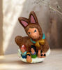 Unique nativity ornament featuring the Holy Family and a llama, crafted from terracotta by Peruvian artisans for Christmas.