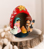 Unique gourd ornament featuring a nativity scene inside, highlighting Peruvian craftsmanship for Christmas.