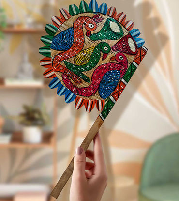 Hand-painted wooden fan featuring vibrant bird designs, showcasing traditional Indian folk art for home decor and collectors.